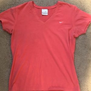 Pink Nike V-neck shirt